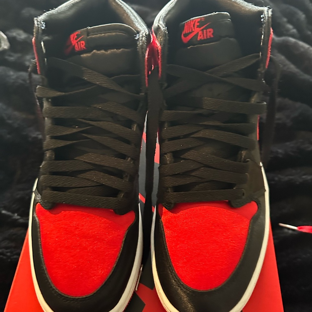Nike Jordan 1 Women’s Black and Red Satin Sneakers